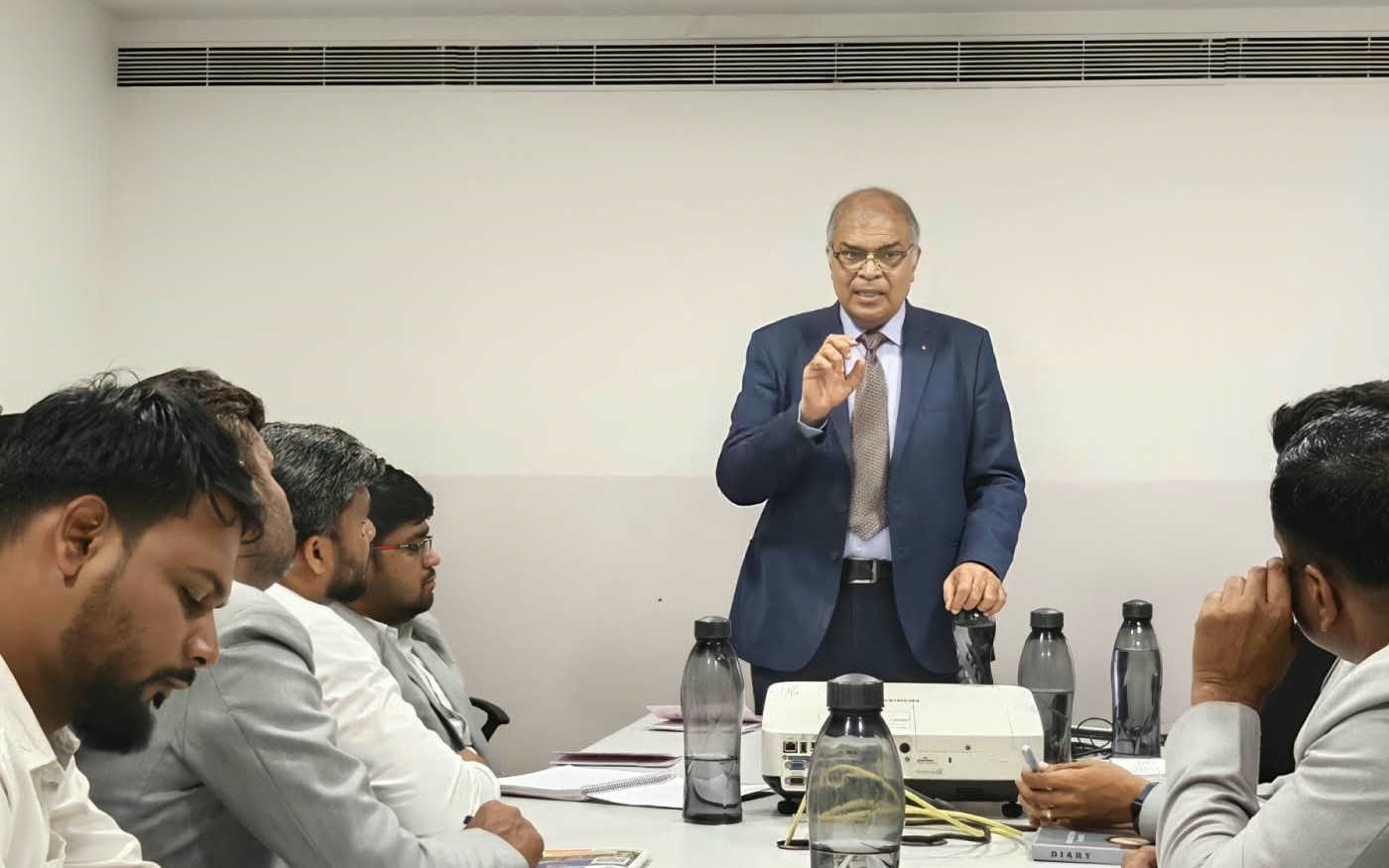 Deepesh Kumar conducting a corporate training session